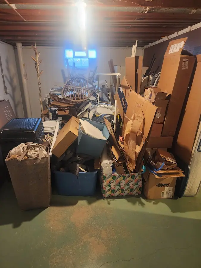 Roll-off dumpster container at job site for 8 Yard Dumpster Rental in Belmar